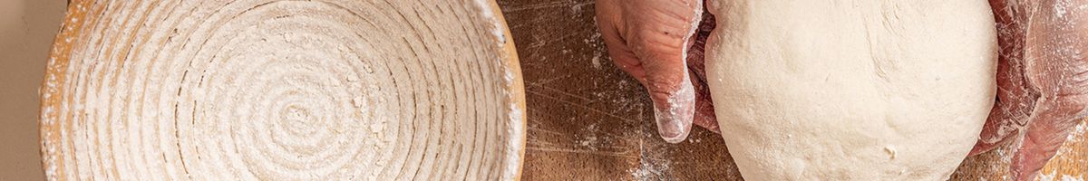 Dough mastery in action with fresh bread dough being shaped