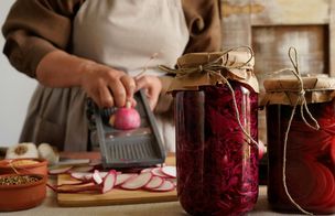 Home cook slicing radishes for fermentation