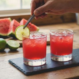 Two vibrant, chilled watermelon, lime, and Campari 