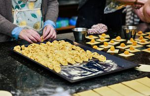 Student at DCS shaping tortellinis