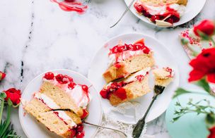 Overhead flat lay of white chocolate cheesecake, cherry chocolate no-churn ice cream, giant meatballs with pasta and Swedish cake bars on a dark surface, Dublin Cookery School Growing Gourmets Junior Summer Camp