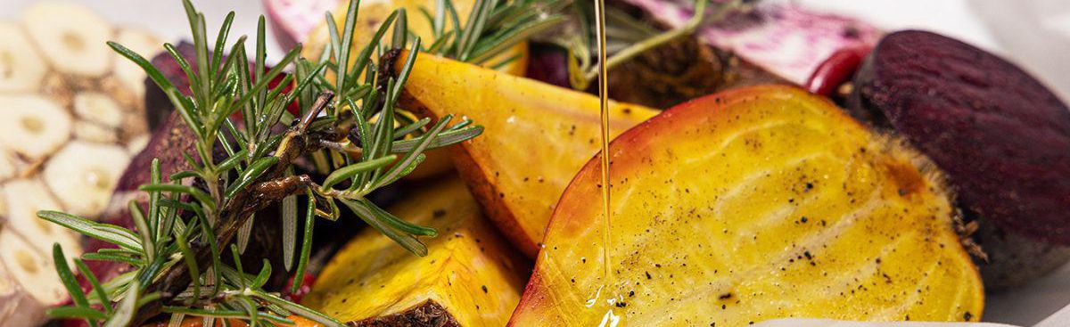 Roasted golden beets and rosemary in parchment paper